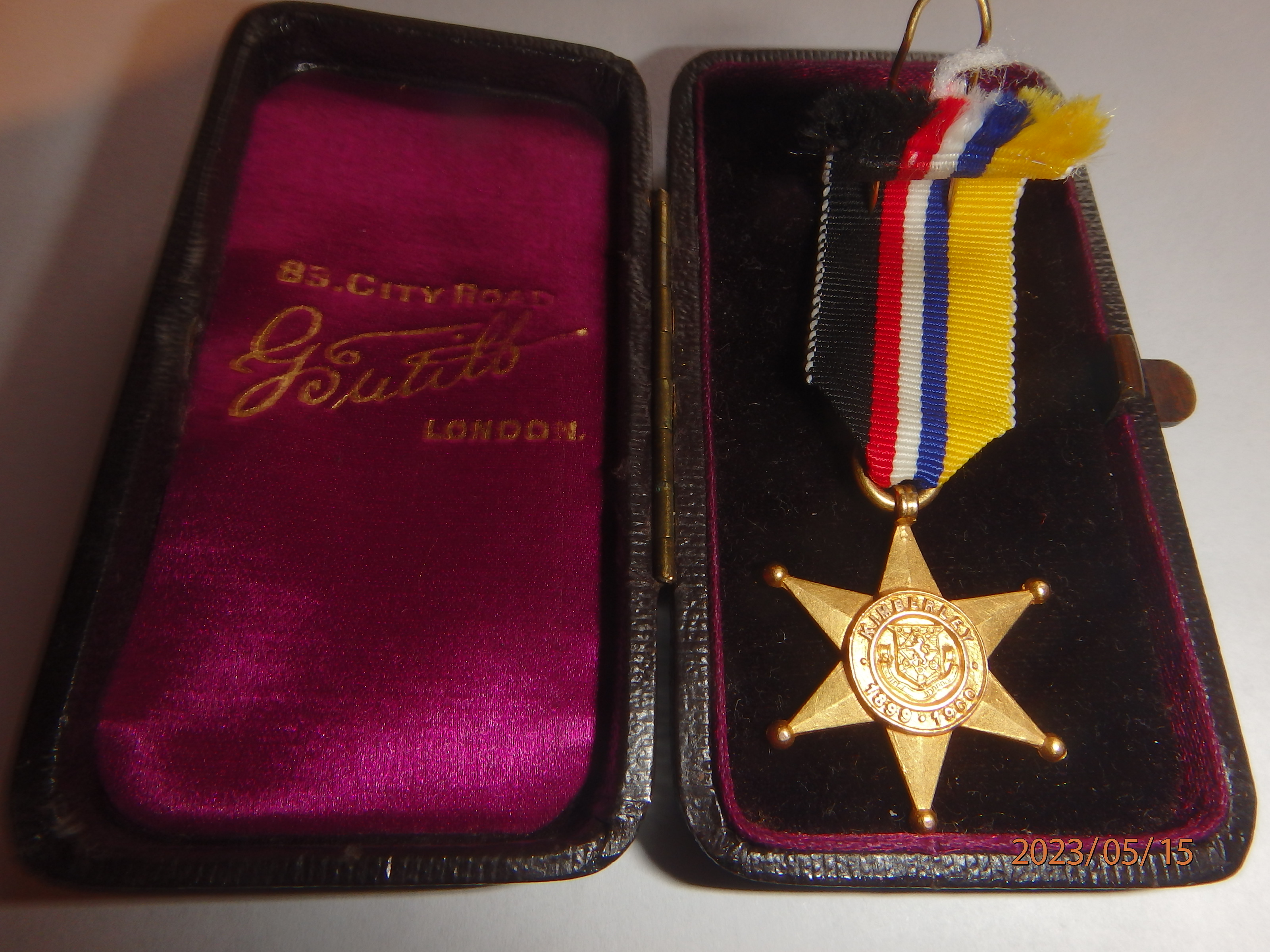 Miniature Gold Kimberley Star Medal in case